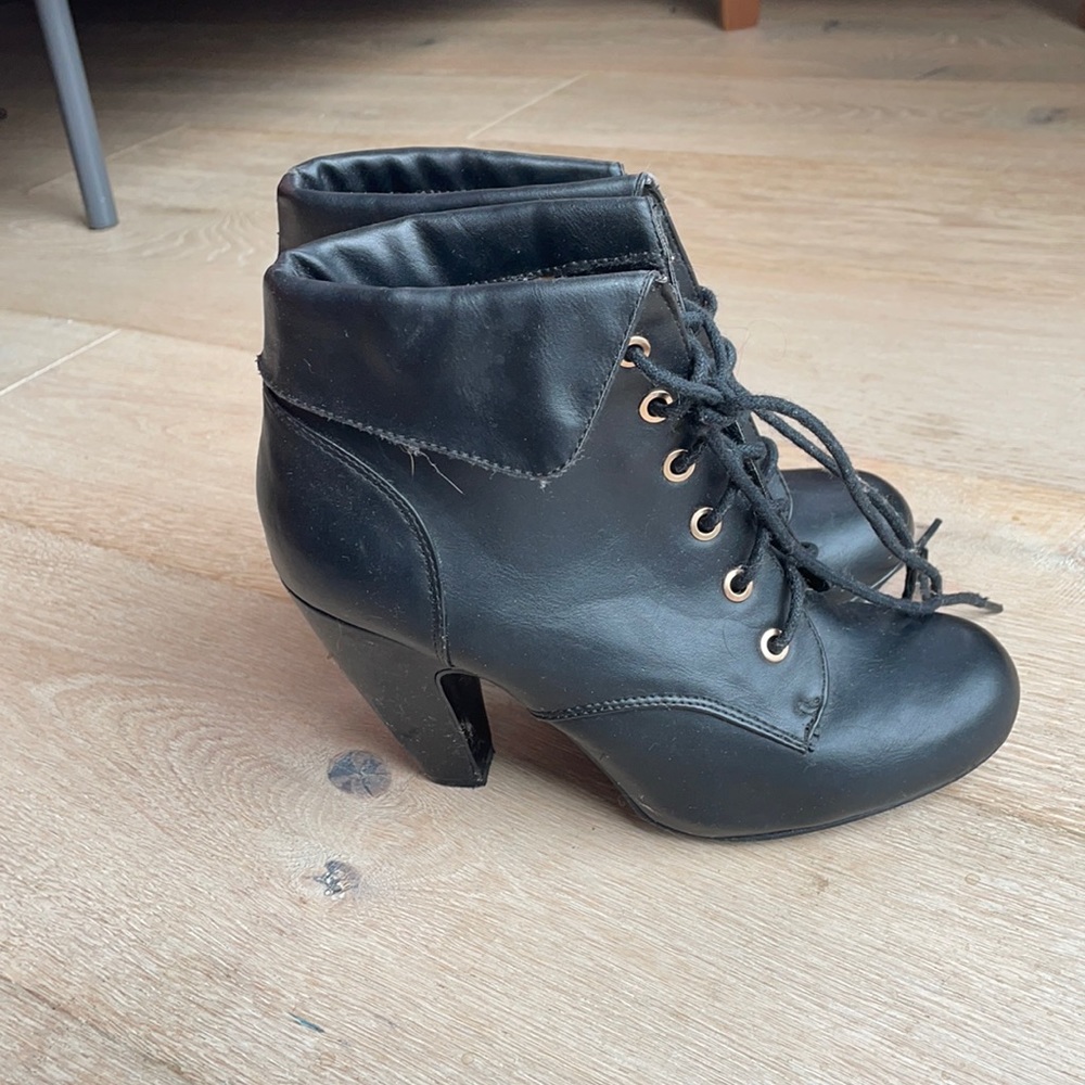 Black heeled lace up booties
